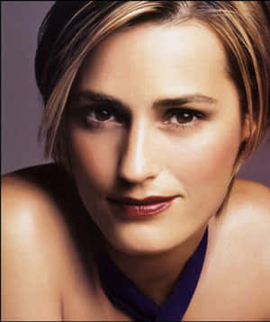 Yasmin Le Bon Gracefully Poised In High Fashion Attire Wallpaper