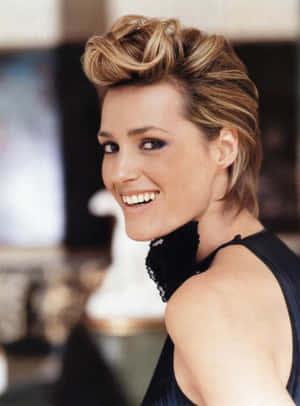 Yasmin Le Bon In Elegant Red Carpet Attire Wallpaper