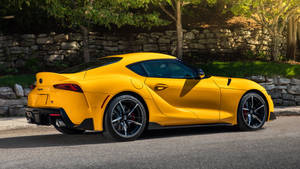 Yellow 4k Supra Wallpaper