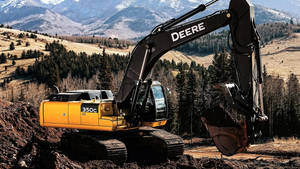 Yellow And Black John Deere Excavator Wallpaper