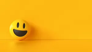 Yellow Ball With Happy Smile Wallpaper