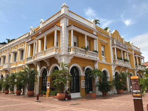 Yellow Building Exterior In Cartagena Wallpaper