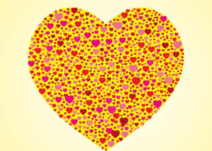 Yellow Heart On A Wooden Surface Wallpaper