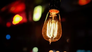 Yellow Incandescent Light Bulb Wallpaper