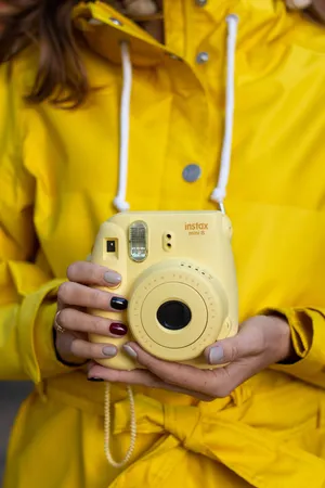Yellow Instax Mini 8 Camera Wallpaper
