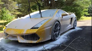 Yellow Lamborghini Car Wash Time Wallpaper
