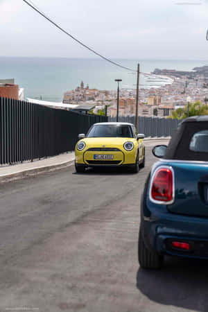 Yellow Mini Cooper S E Cityscape Wallpaper