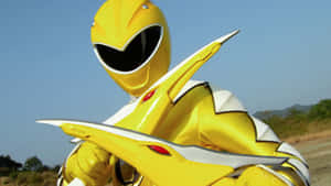 Yellow Rangerin Action Pose Wallpaper