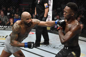 Yoel Romero Fighting Israel Adesanya For Ufc Middleweight Championship Wallpaper