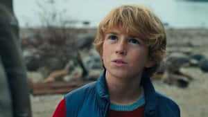 Young Actor Beach Scene Wallpaper