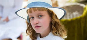 Young Actressin White Hat Wallpaper