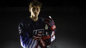 Young American Hockey Star, Jack Hughes In Action Wallpaper