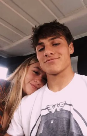 Young Couple Enjoying A Romantic Moment Together Wallpaper