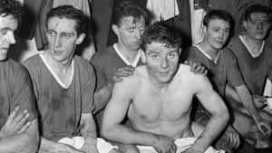 Young Footballer Duncan Edwards With Other Football Players Wallpaper