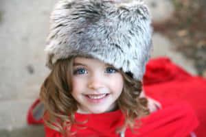 Young Girl Winter Hat Smile Wallpaper