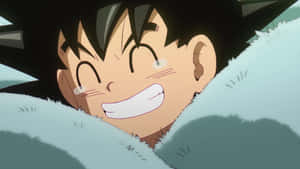 Young Goku Smiling Brightly Wallpaper