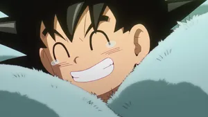Young Goku Smiling Brightly Wallpaper