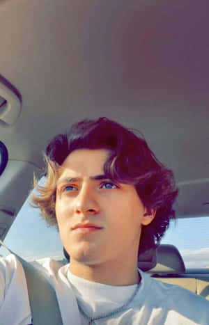 Young Man Car Selfie Sunlight Wallpaper