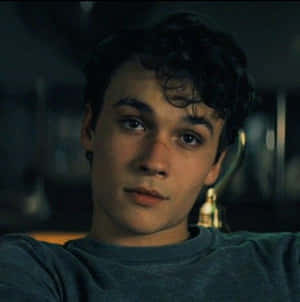 Young Man Contemplative Look Wallpaper