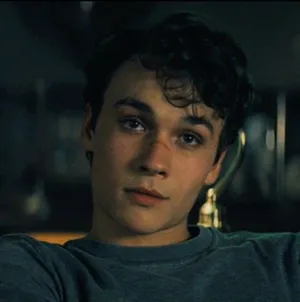 Young Man Contemplative Look Wallpaper