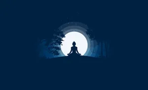 Young Man In A Serene Environment Practicing Concentration During Meditation Wallpaper