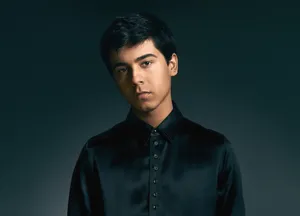 Young Manin Black Shirt Portrait Wallpaper