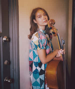 Young Musicianwith Cello Wallpaper