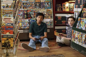 Young Sheldon Comic Book Store Scene Wallpaper