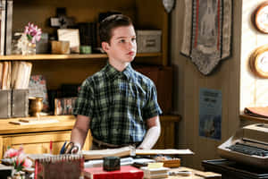 Young Sheldon Contemplative Moment Wallpaper