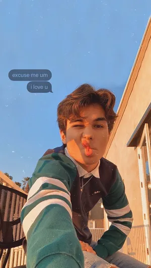 Young Teenage Boy Embracing His Unique Sense Of Style. Wallpaper