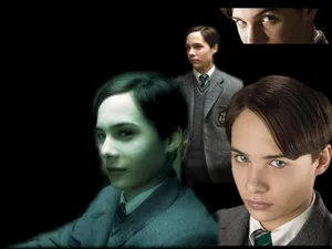 Young Tom Riddle Standing In A Dark Environment Wallpaper