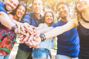 Youth Embracing Nature And Adventure Wallpaper