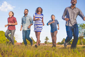 Youth Group Enjoying Outdoor Activity Wallpaper