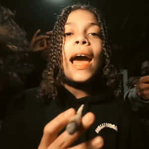 Youth Holding Object Nighttime Wallpaper