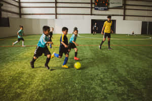 Youth Indoor Soccer Match Action.jpg Wallpaper