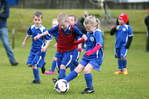 Youth Soccer Match Action.jpg Wallpaper