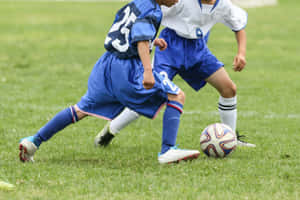 Youth Soccer Midfielders Competing.jpg Wallpaper