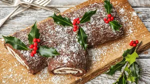 Yule Log Cake With Holly Wallpaper