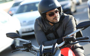 Yuvan Shankar Raja On Motorcycle Wallpaper