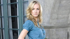 Yvonne Strahovski In Front Of Wall And Door Wallpaper