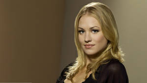 Yvonne Strahovski On Brown Background Wallpaper