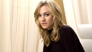 Yvonne Strahovski Seated Near White Curtains Wallpaper