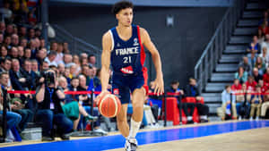 Zaccharie Risacher Basketball Action Wallpaper