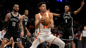 Zaccharie Risacher Basketball Action Wallpaper