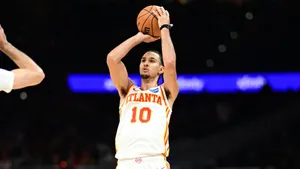 Zaccharie Risacher Shooting Basketball Wallpaper