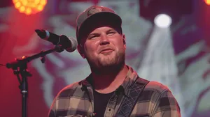 Zach Bryan Performing Live Wallpaper