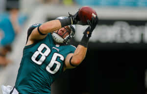 Zach Ertz Catching Football Wallpaper