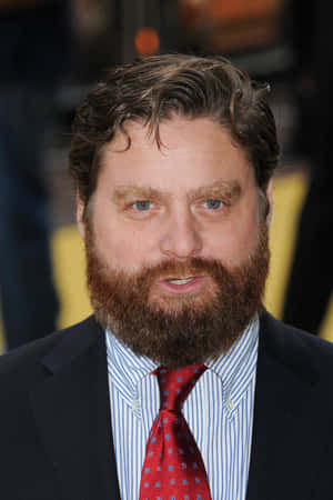 Zach Galifianakis Looking Stylish In A Classic Tuxedo Wallpaper