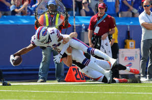 Zay Jones Tackled Mid-air Wallpaper