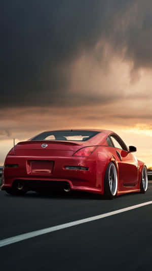 Zoom Around The City With A Nissan 350z Wallpaper